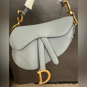 Authentic Christian Dior Saddle Bag Cloud Blue. Like new condition, bag only.